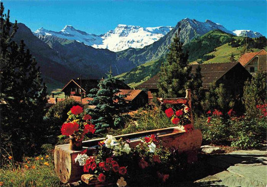 13995828 Adelboden BE Brunnentrog Blick gegen Steghorn Wildstrubel Fitzer Berner