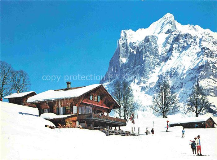 14025770 Grindelwald BE Berghaus Blick gegen Wetterhorn Berner Alpen Winterpanor