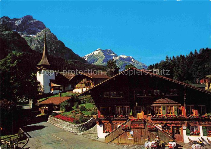 14025777 Gsteig Saanen BE Ortsmotiv mit Kirche Blick gegen Oldenhorn Diablerets