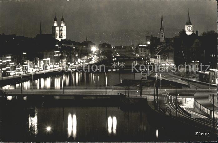 12319483 Zuerich Limmatquai Grossmuenster Kirche Nachtaufnahme Zuerich