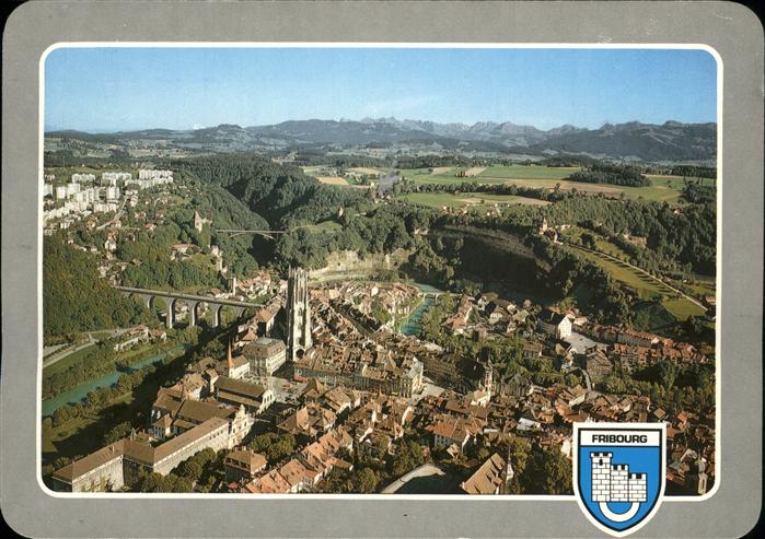 11434706 Fribourg FR Vue aerienne Cathedrale Pont Wappen Alpenpanorama