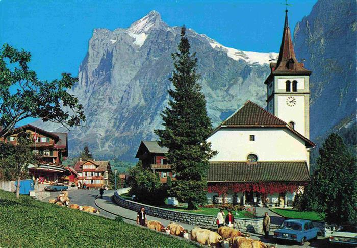 13978315 Grindelwald_BE Motiv mit Kirche Blick gegen Wetterhorn Berner Alpen