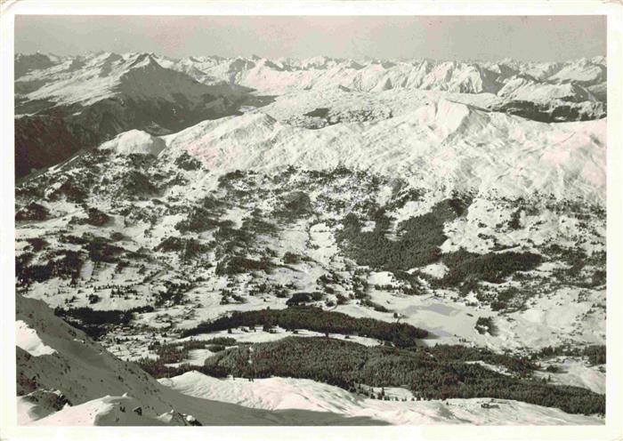 13983181 Lenzerheide_GR Vue panoramique hivernale sur la vallée de la chaîne alpine