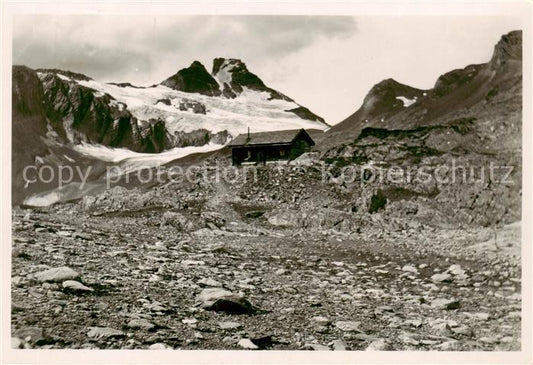 13843064 Elm  GL Panixerpass Huette mit Hausstock und Meergletscher