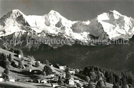 13190552 Beatenberg Eiger Moench und Jungfrau Fliegeraufnahme Beatenberg