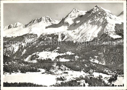 11630828 Arosa GR Ortsansicht mit Alpen