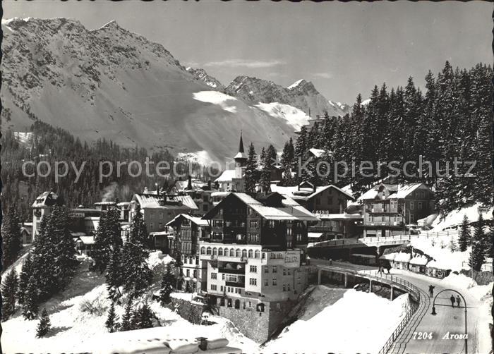 11635719 Arosa GR Ortsansicht mit Kirche und Alpen Wintersportplatz