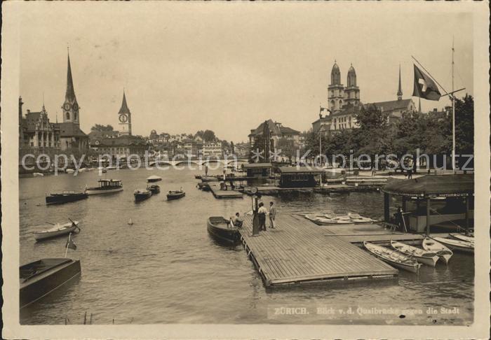 11640864 Zuerich Blick von der Quaibruecke Limmat Muenster Kirche