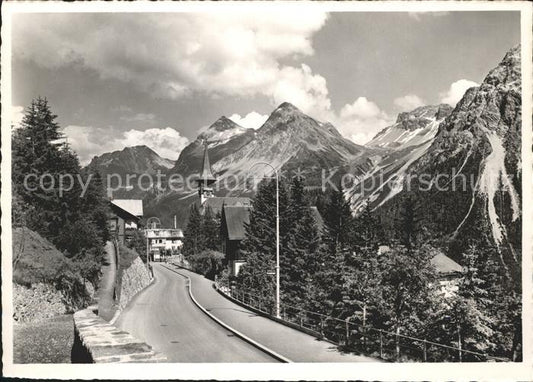 11649498 Arosa GR Dorfkirche mit Furkapass