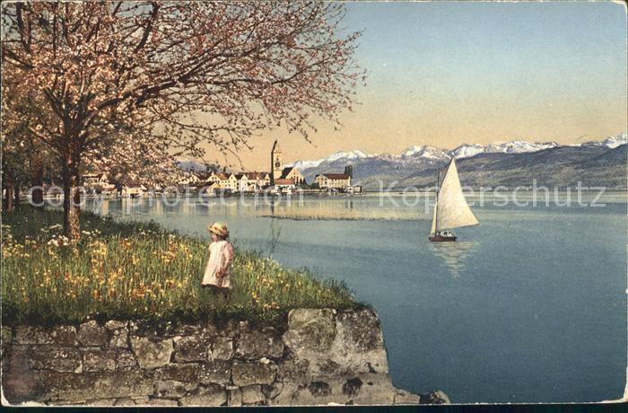 11651603 Meilen Fruehling am Zuerichsee Kind Segelboot Alpenpanorama