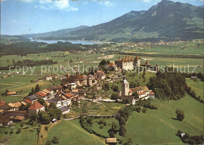 11871608 Gruyeres FR Fliegeraufnahme Au fond Broc  Gruyeres