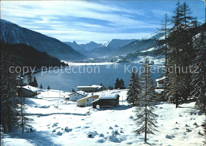 11865213 Davos GR Blick vom Hoehwald auf Davosersee mit Tinzenhorn und Piz Mitge