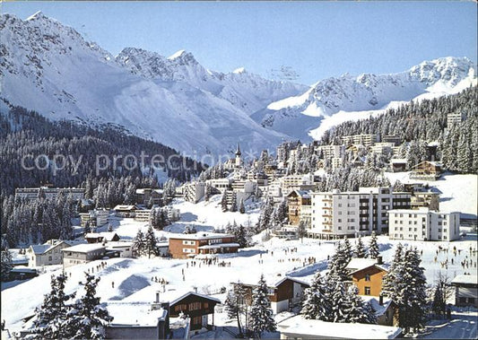 11891377 Arosa GR Vue ville avec Alpes Arosa