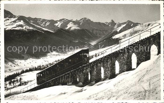 12019932 Davos GR Davos Parsenn Bahn train de montagne vue sur Piz d Aela Tinzenhorn Da