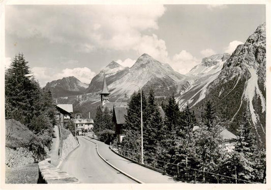 13883716 Arosa GR Église du village avec le col de la Furka Arosa GR